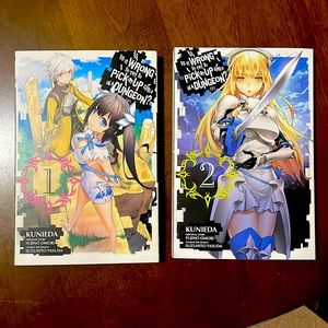 Is it Wrong to Try to Pick Up Girls in a Dungeon Manga Volumes 1 & 2